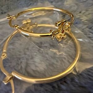 Tory Burch Gold Tone Earrings.